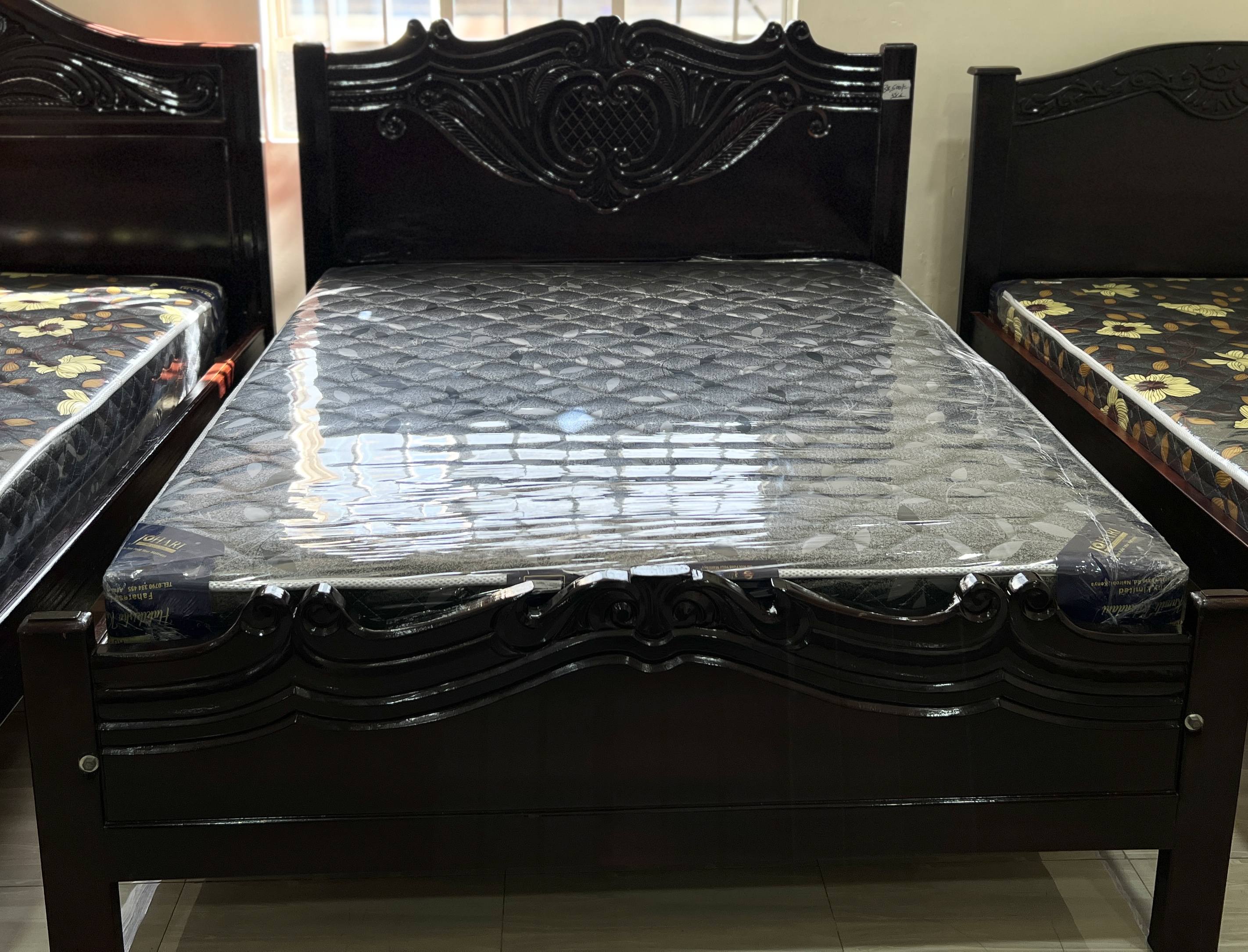 5*6 Dark brown wooden bed